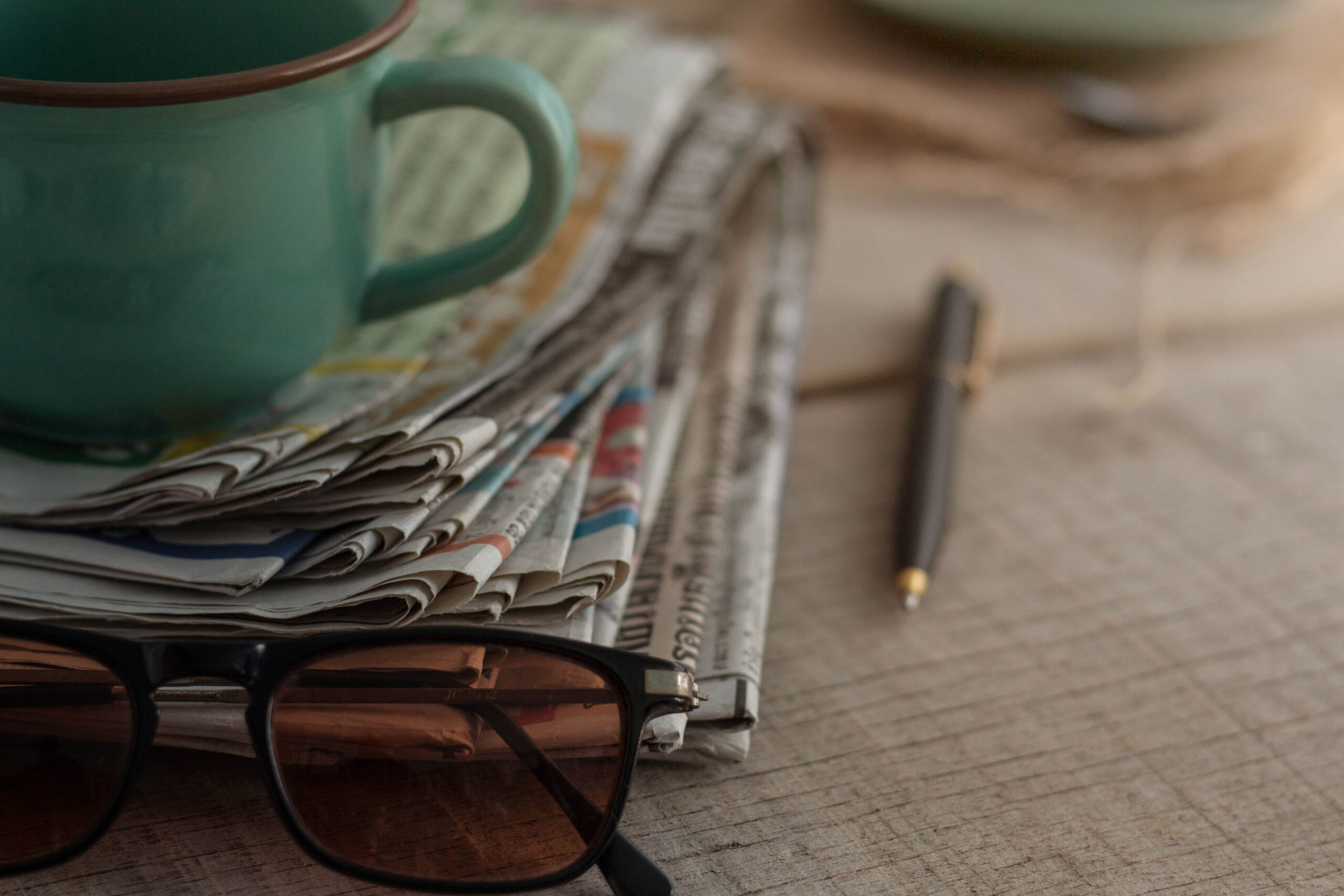 Newspapers on wooden boards.